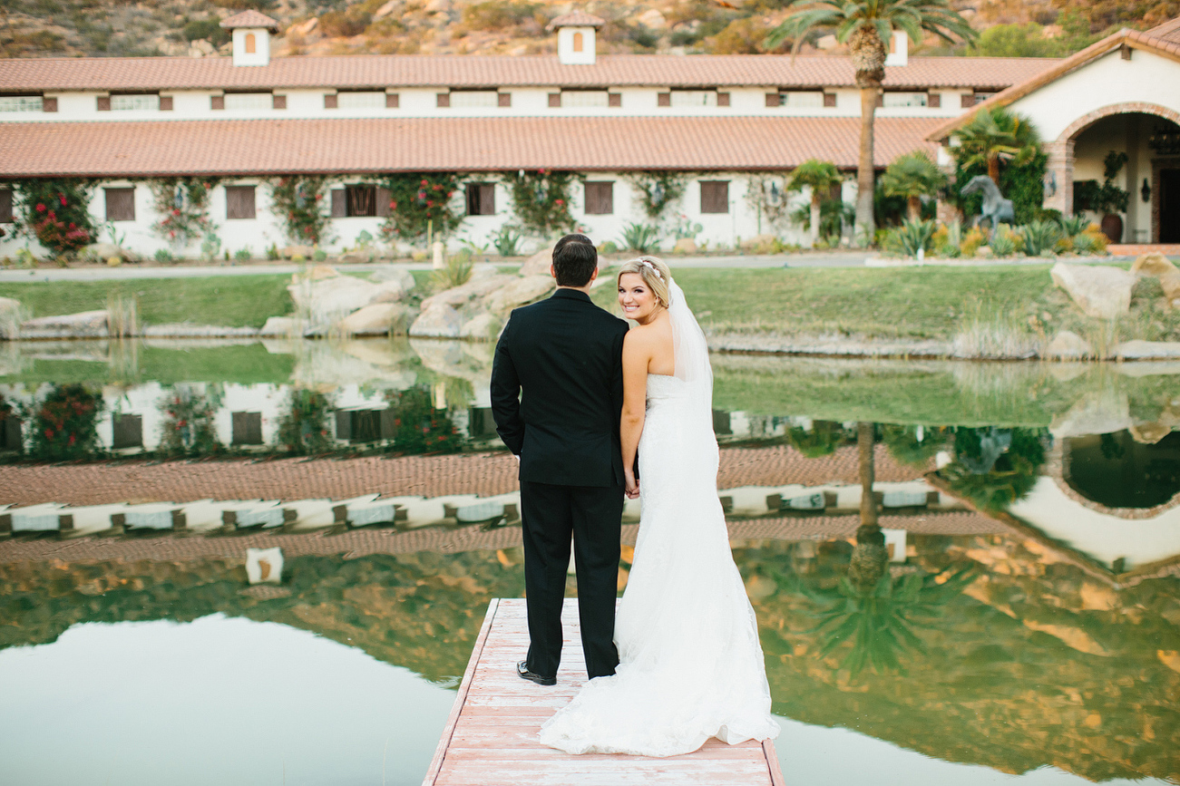 Morgan and Cameron standing on the dock together. 