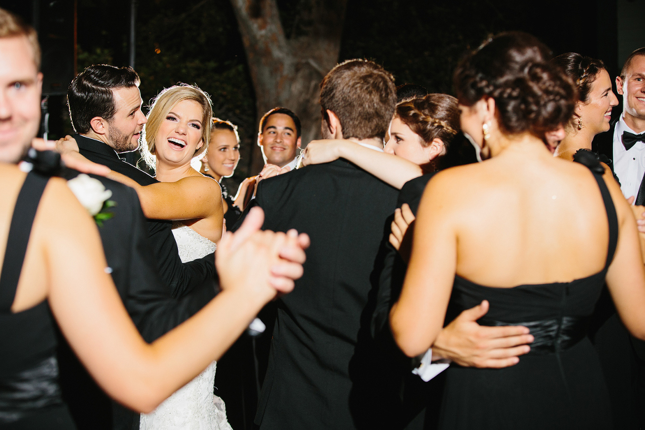 The bridal party joined the first dance. 