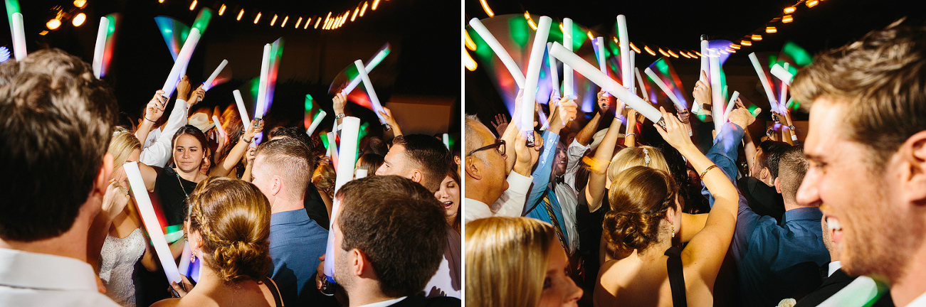 Guests dancing with glowsticks. 