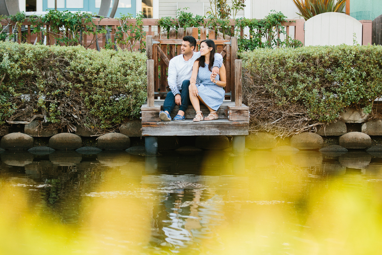 The couple through a bush. 