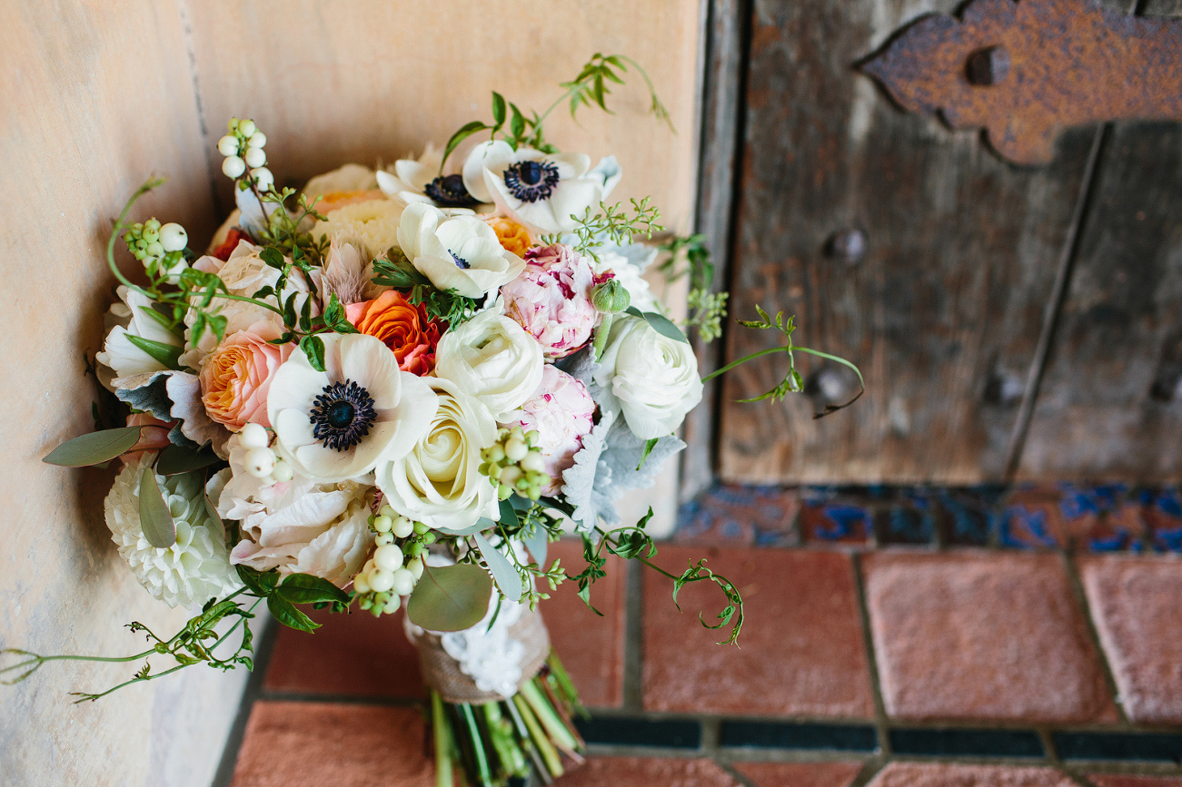 The bridal bouquet leaning in the corner. 