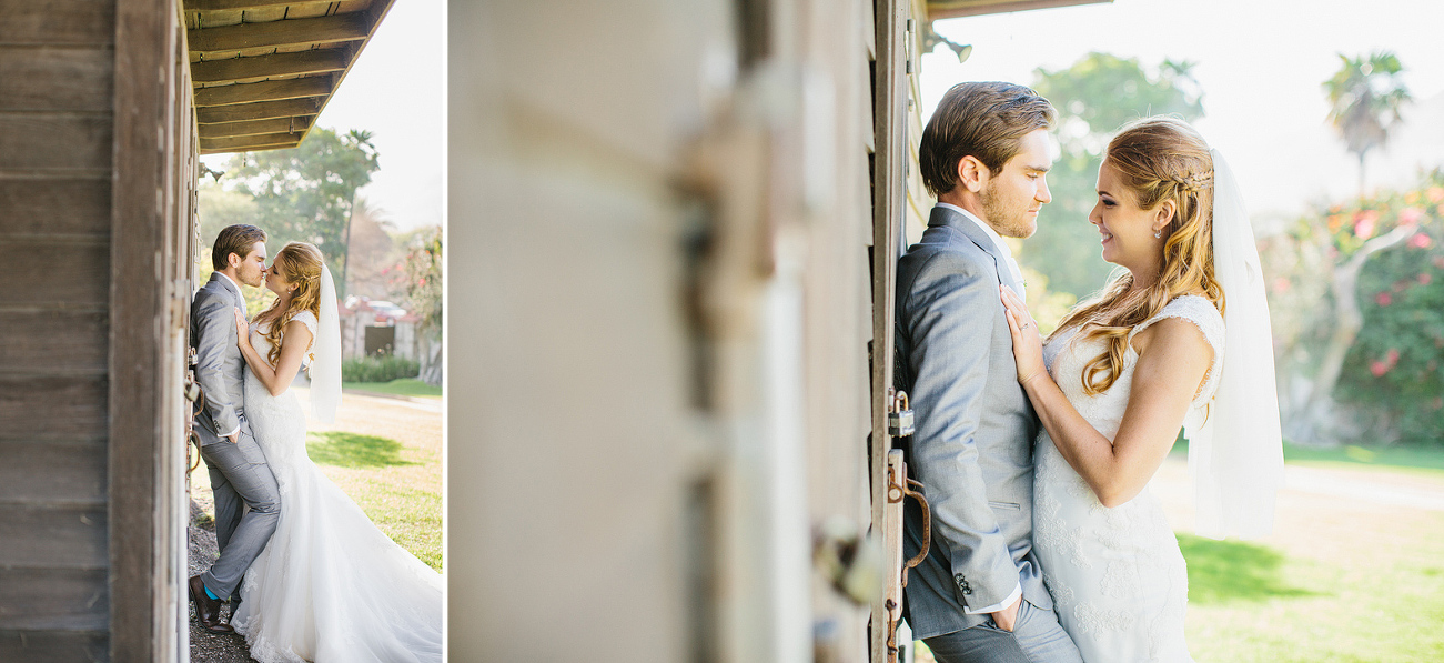 Linda and Dan against a wood building. 