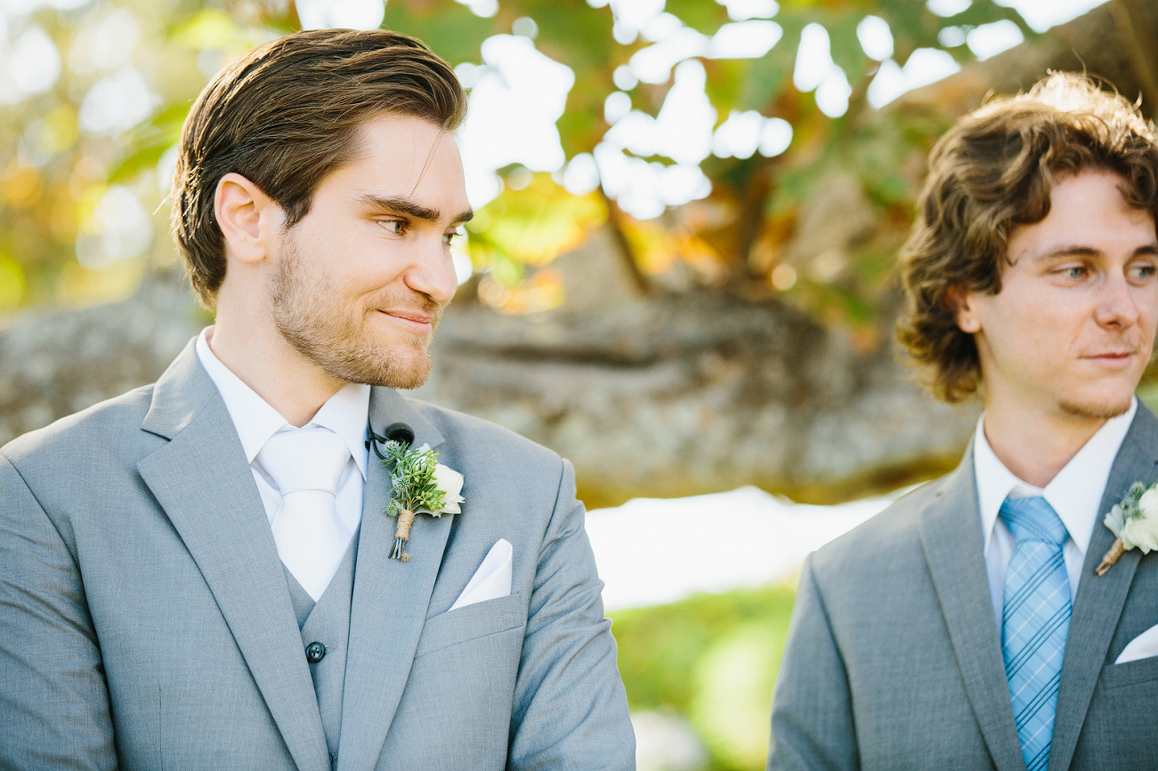 The groom watching the processional. 