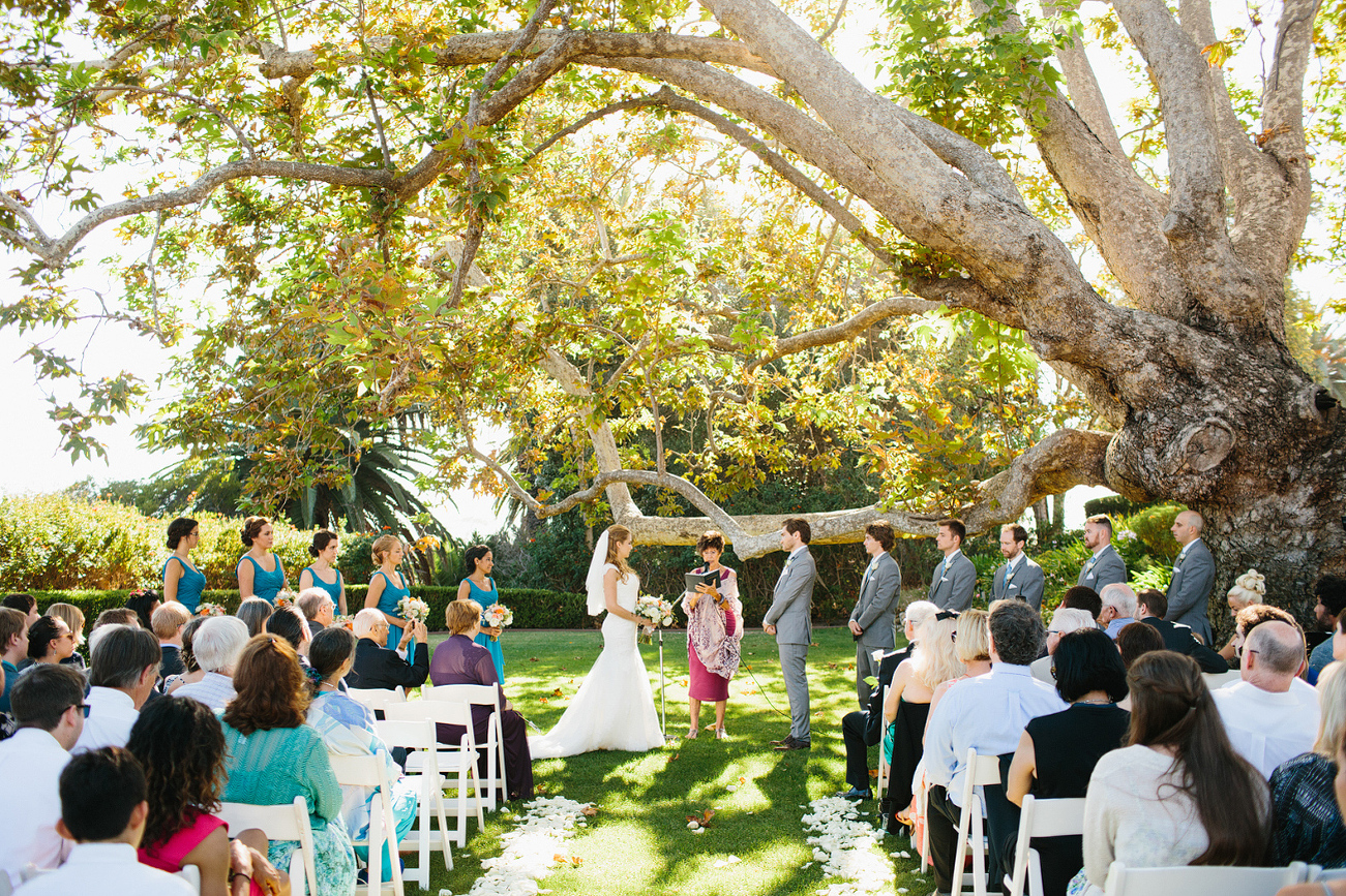 The ceremony under a large photo. 