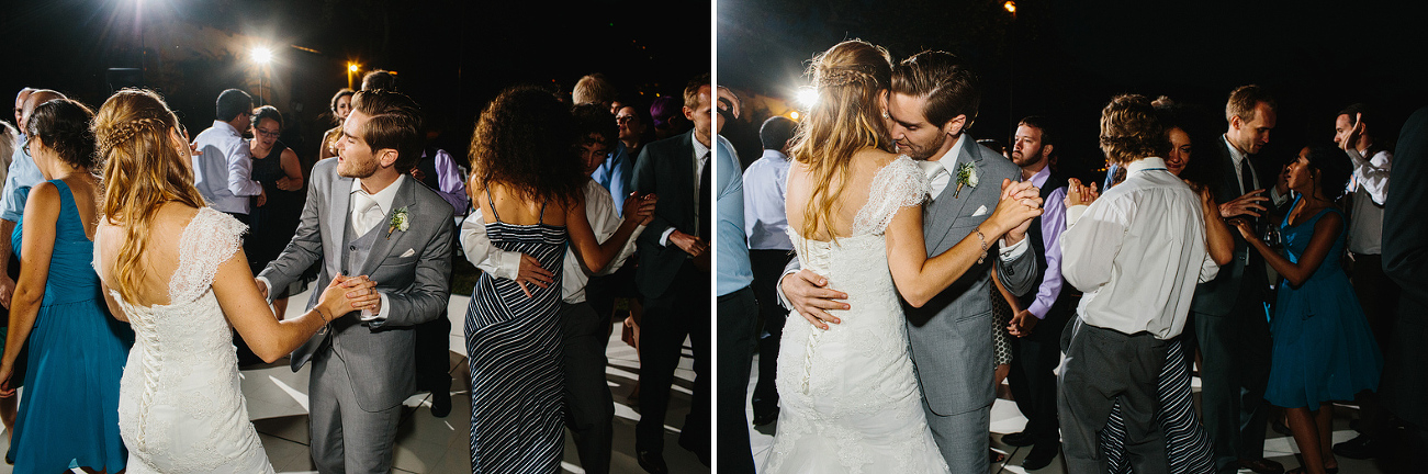 The bride and groom dancing together. 