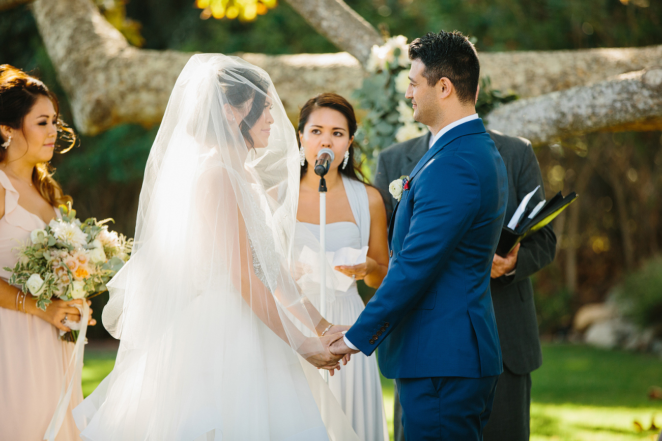 A bridesmaids sharing during the ceremony. 