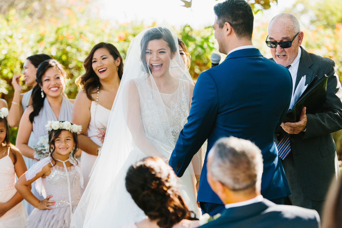 Maily laughing during the vows. 