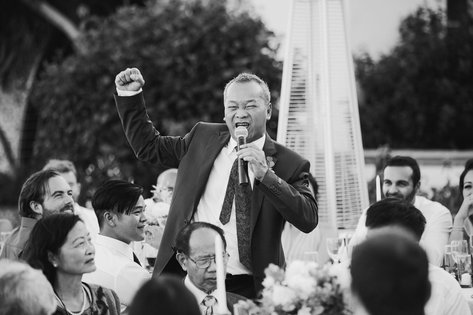 The bride's father excited during the welcome speech. 