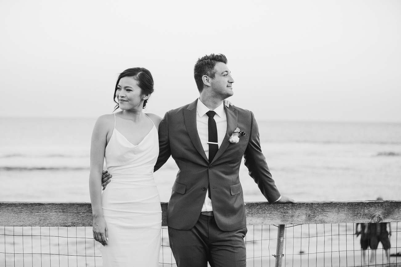 Bride and groom portraits on the beach. 