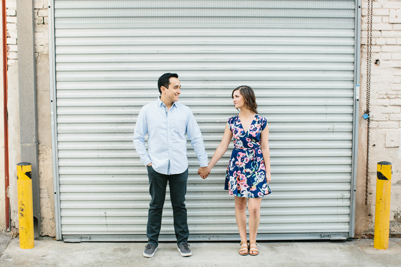 Alix and Anthony in front of a door. 