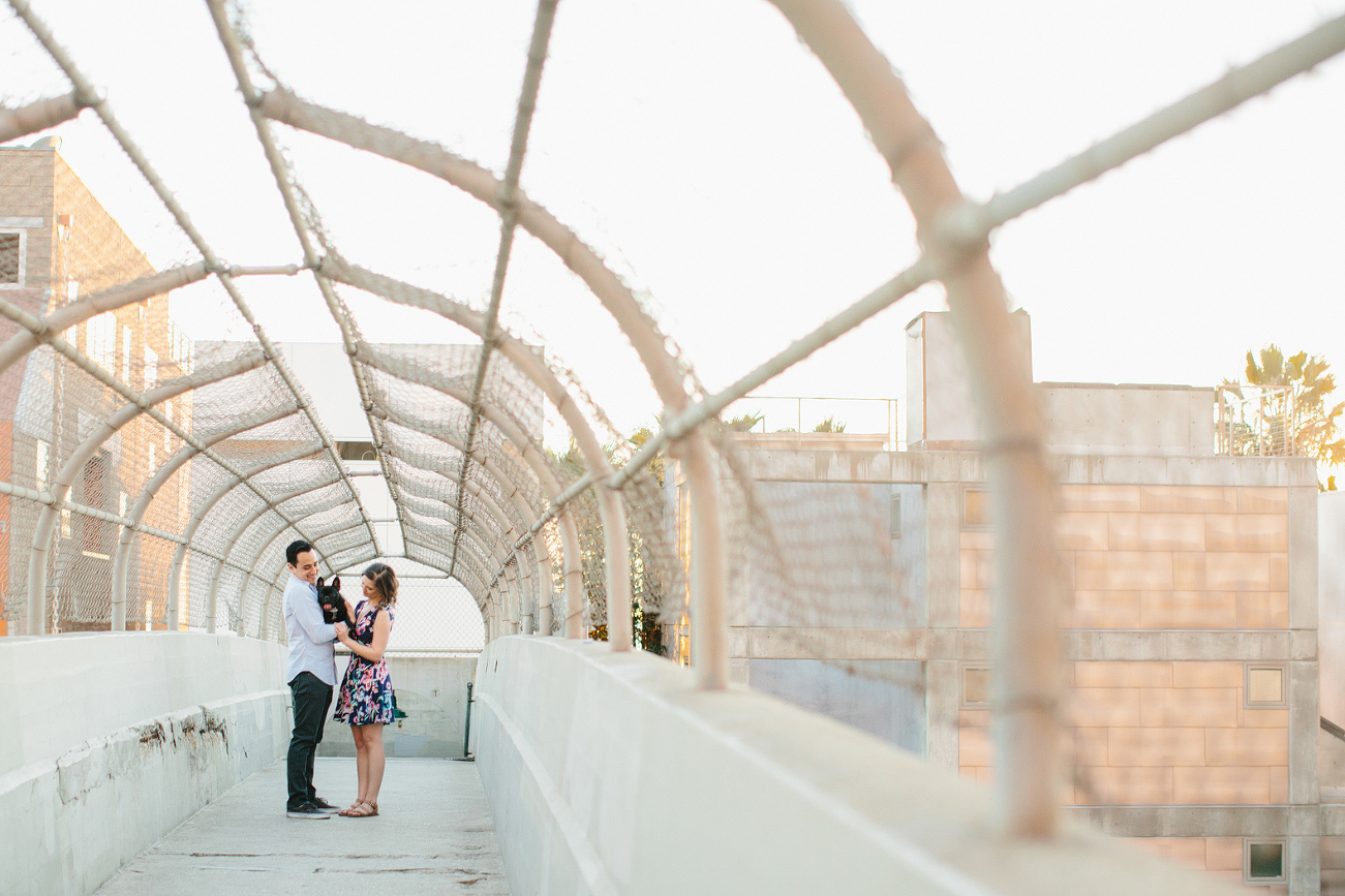 The couple on the gated bridge. 