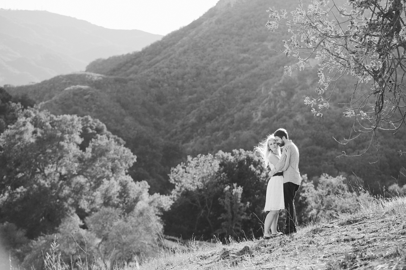 A black and white portrait of Linday and Josh. 