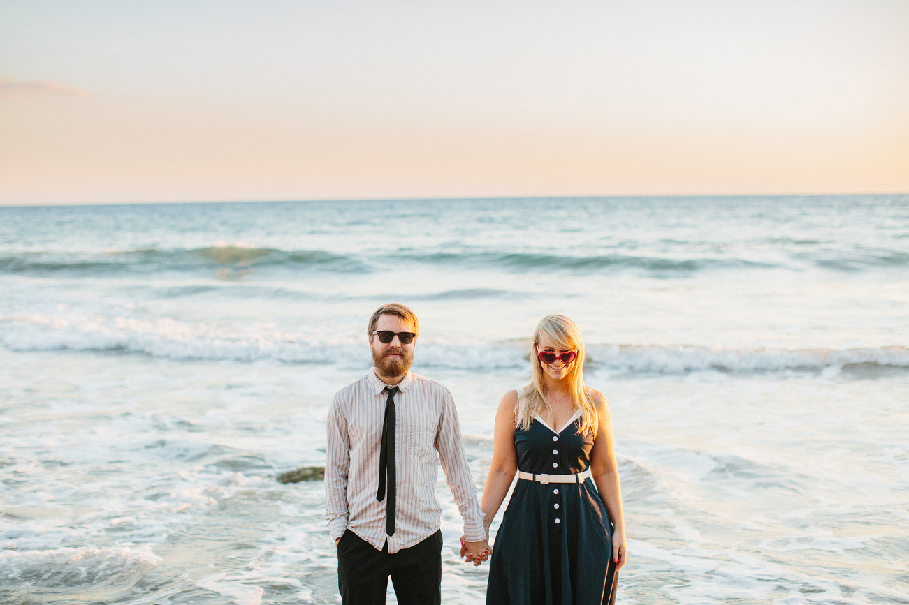 Lindsay and Josh holding hands. 