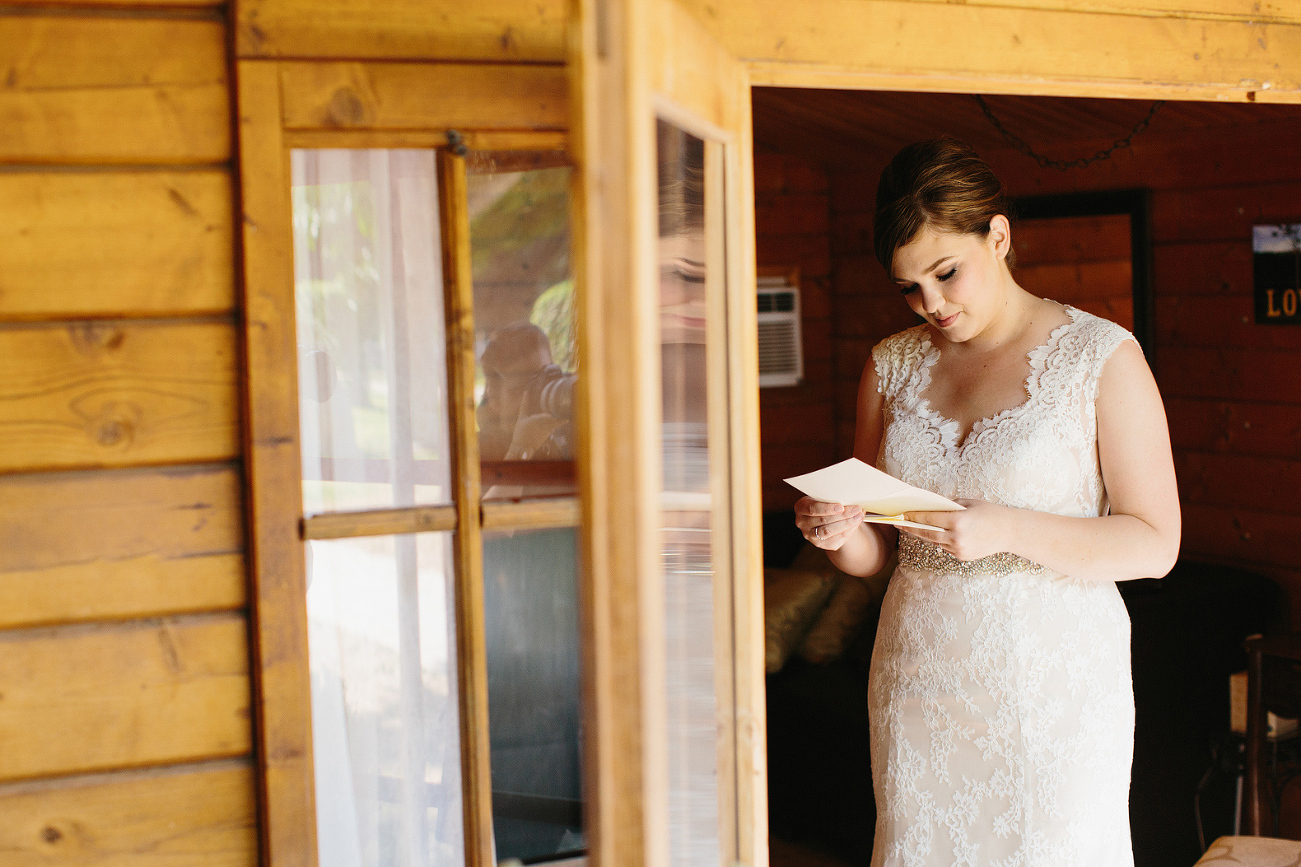 The bride reading a letter. 