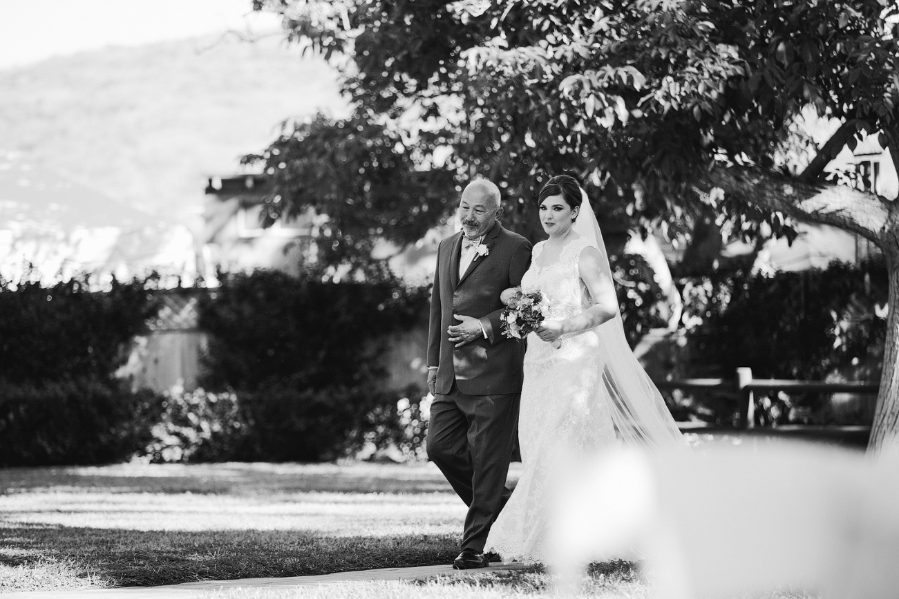 The bride walking down the aisle. 