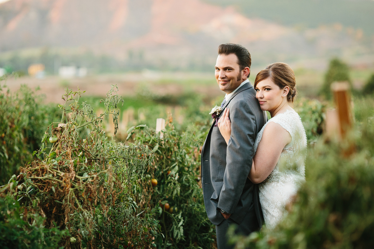 The couple in the tomato vines. 