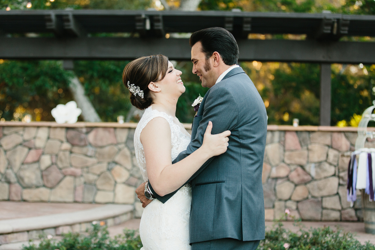 A cute moment between the bride and groom. 