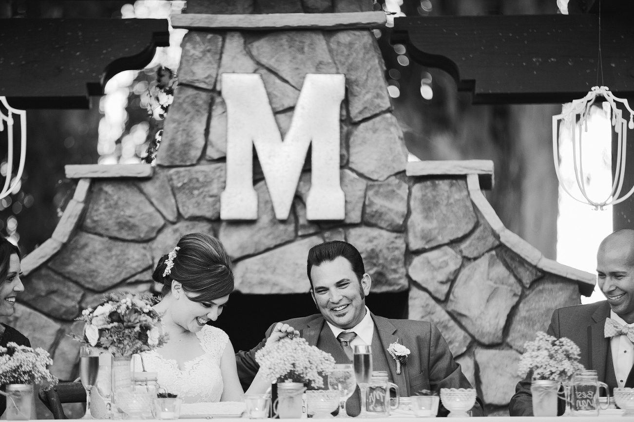 The head table laughing during the speech. 