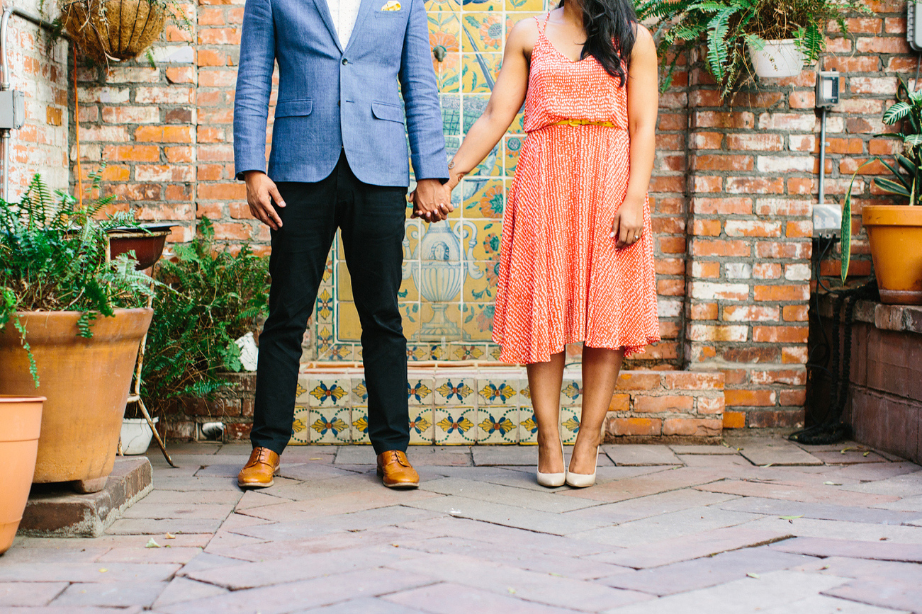 Alanna and David holding hands. 