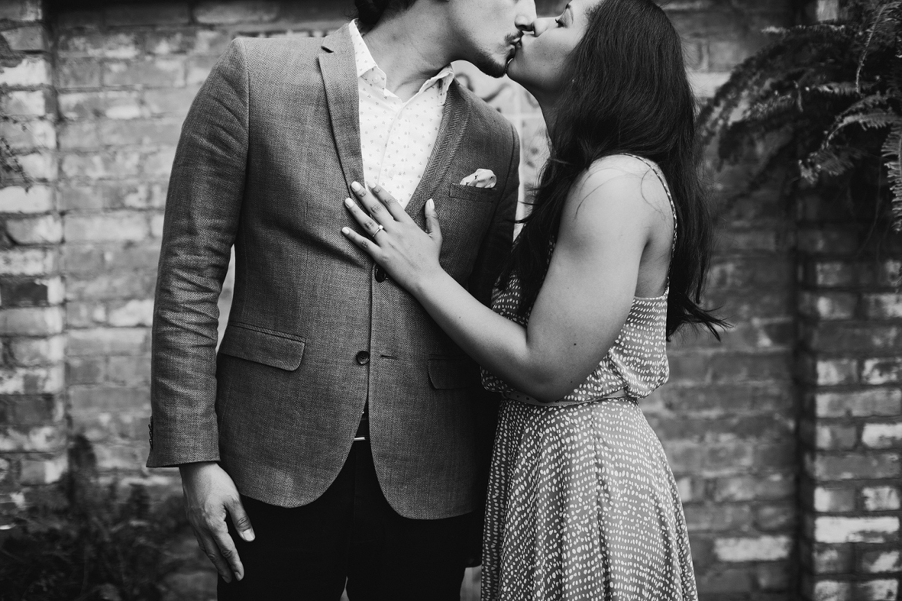 A black and white portrait of the couple. 