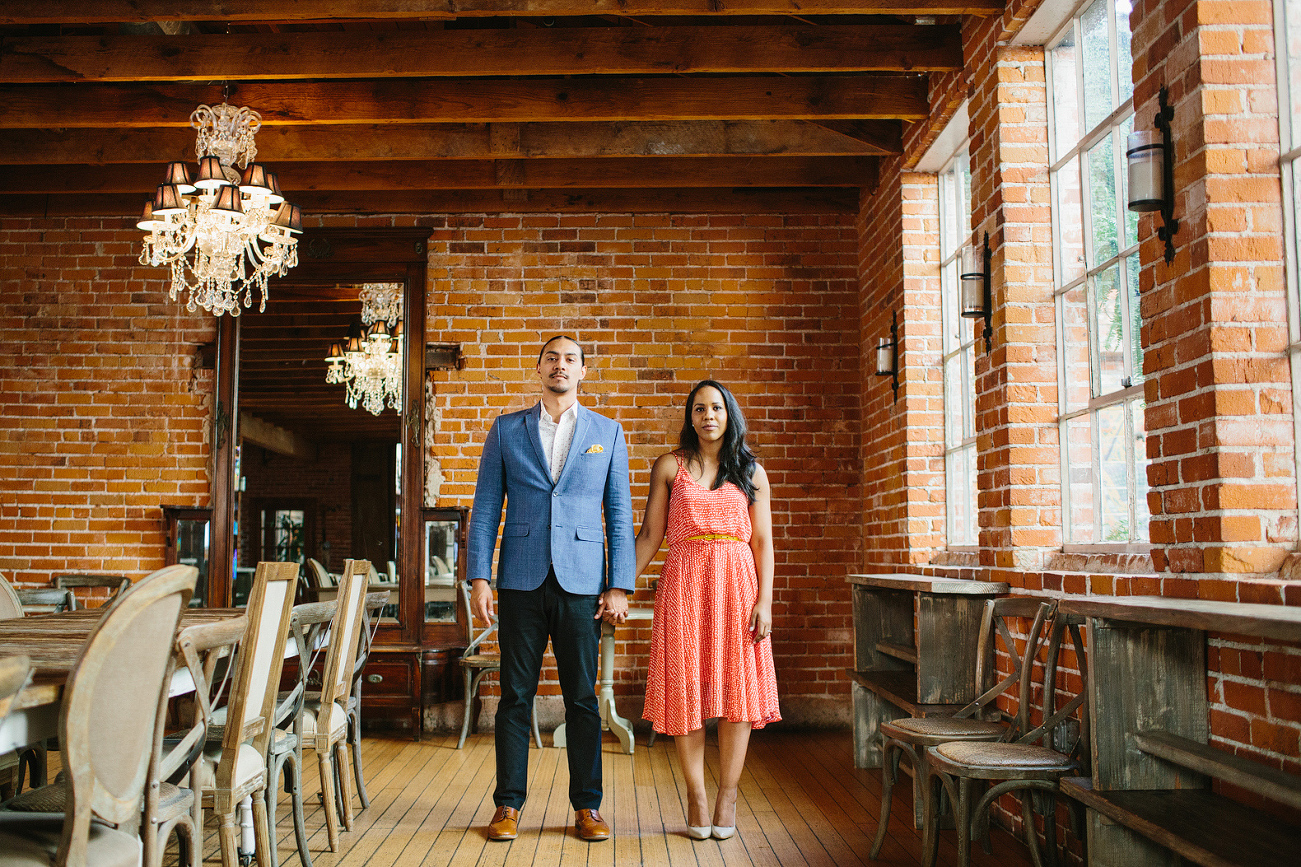 The couple in a brick room. 