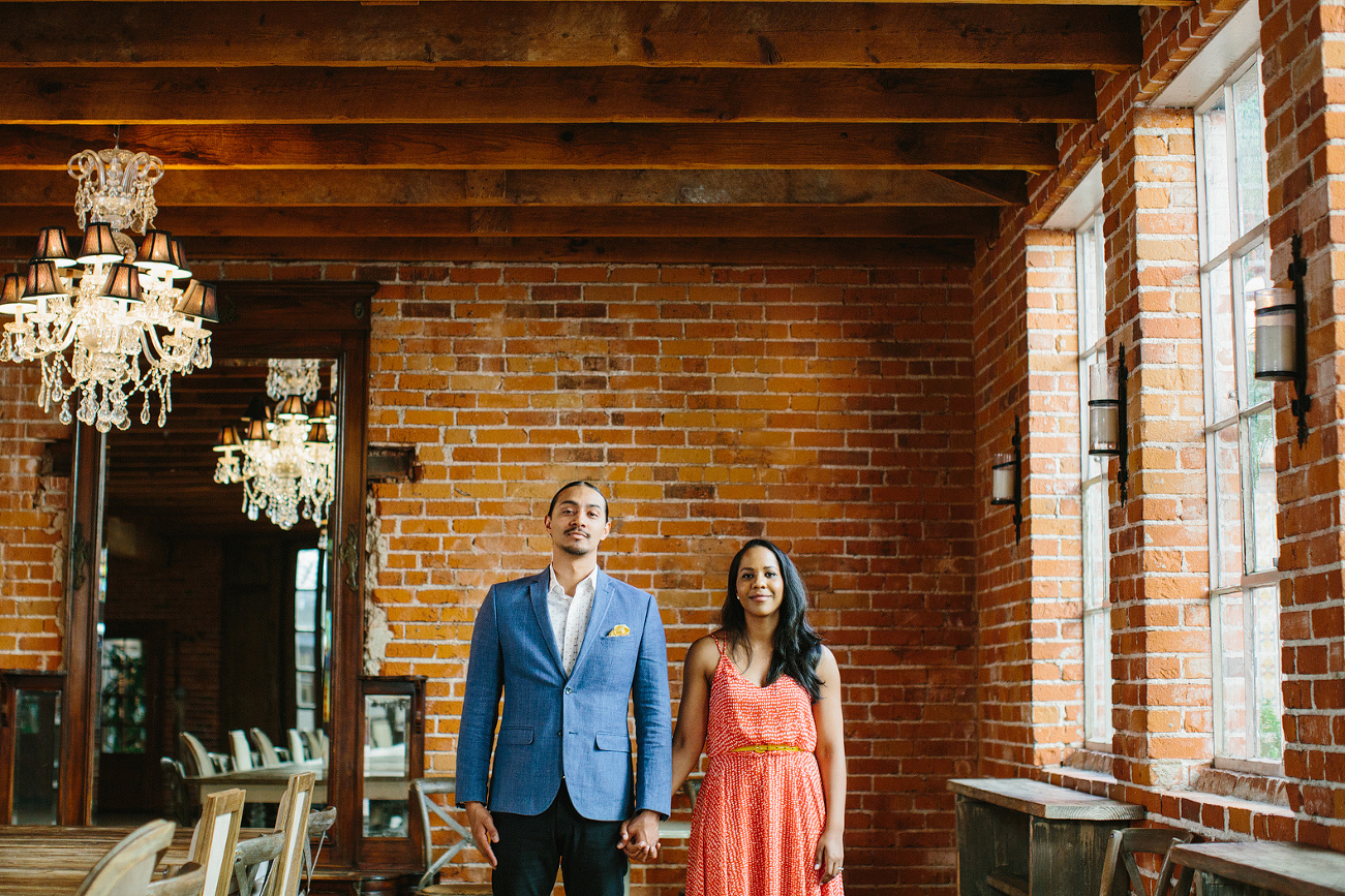 Alanna and David holding hands together. 