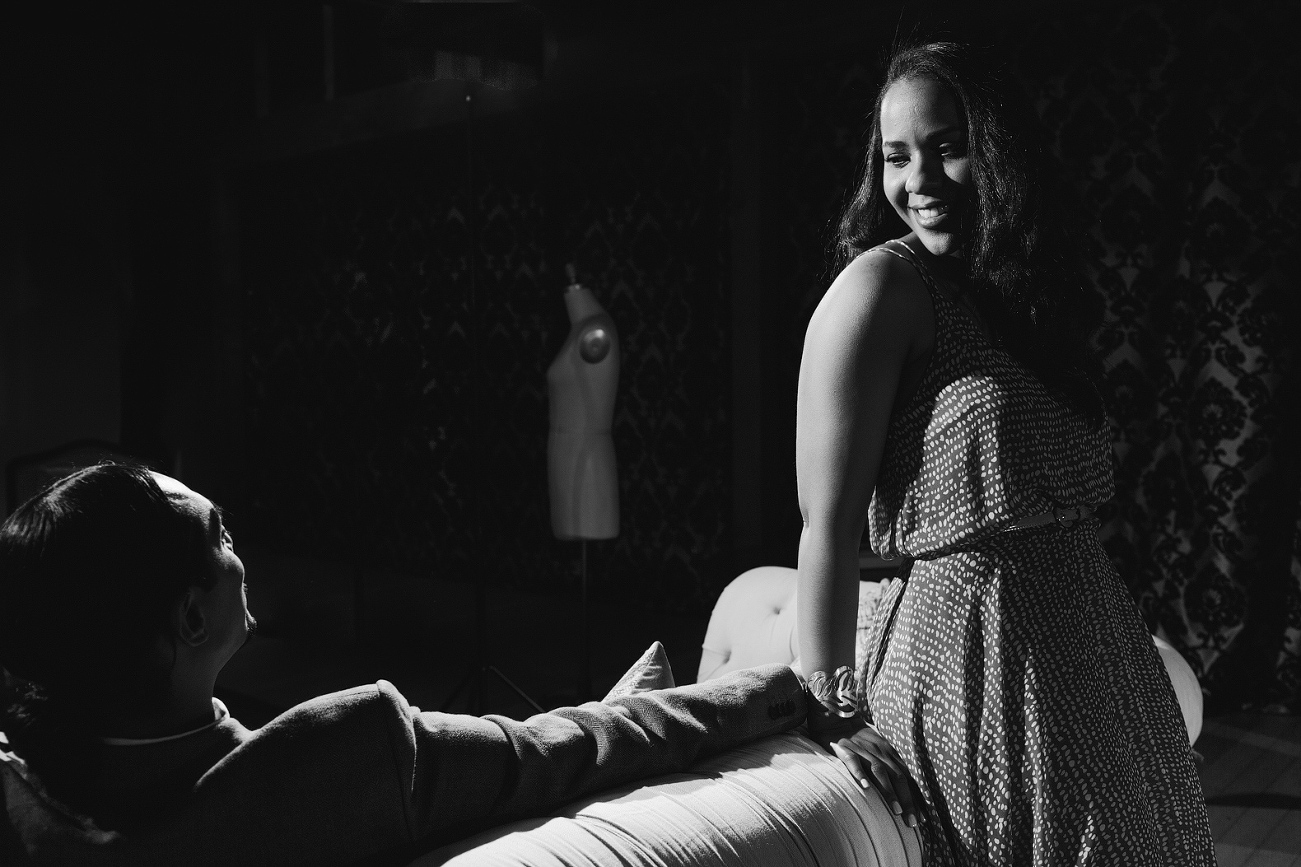 Alanna and David near a couch. 