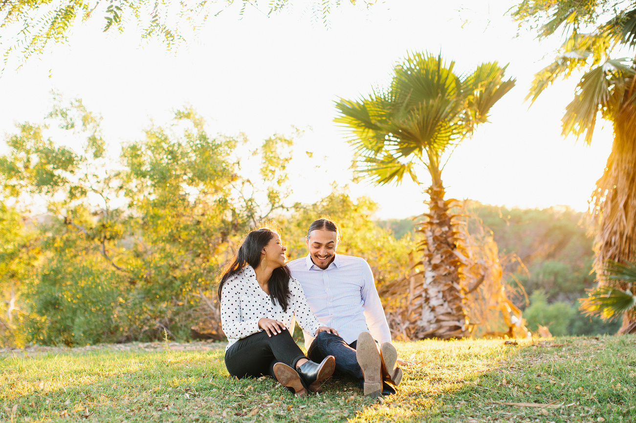 A cute photo of the couple sitting. 