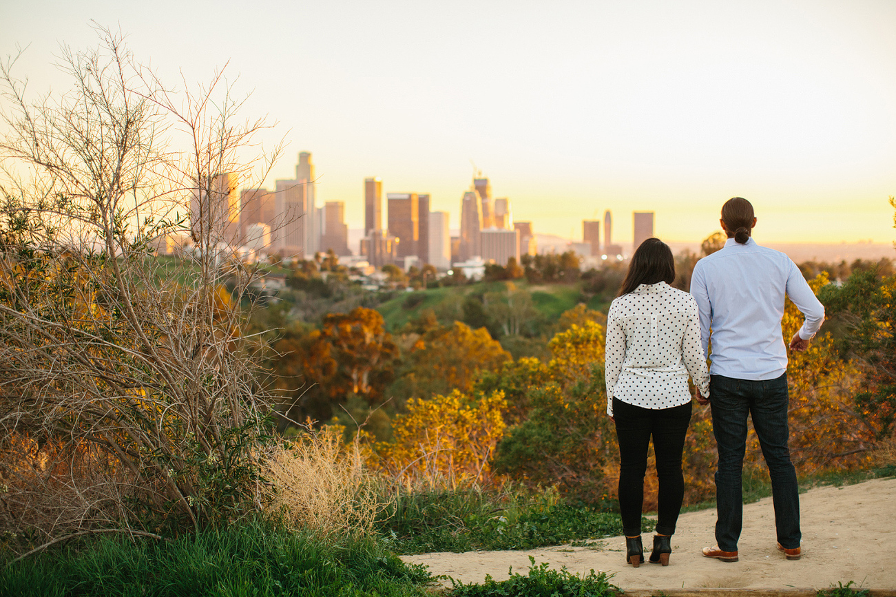 The couple looking out the city. 