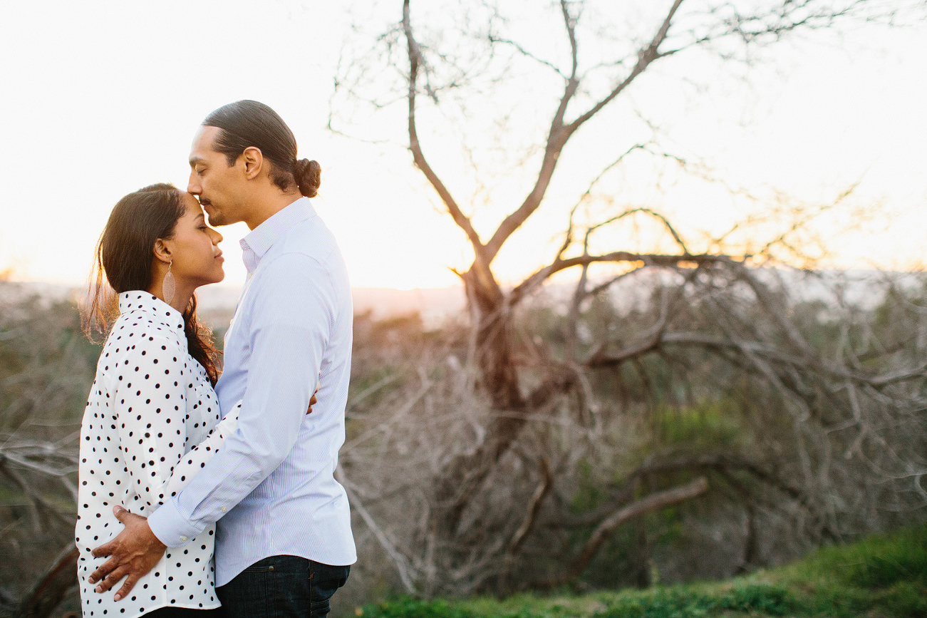 Alanna and David by trees. 