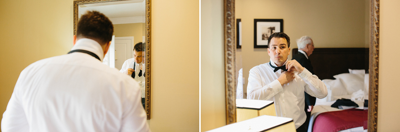 The groom getting dressed. 