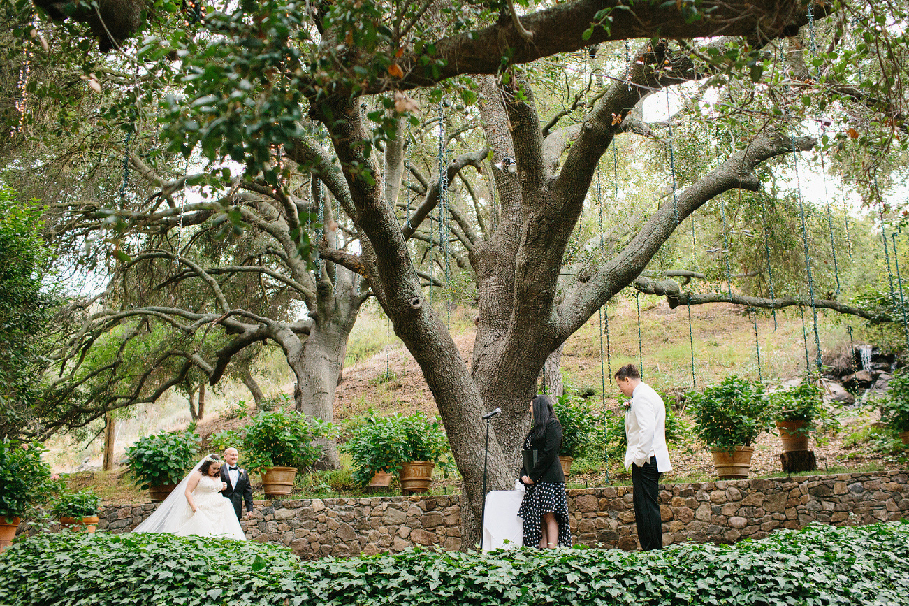 The bride walking to the groom. 