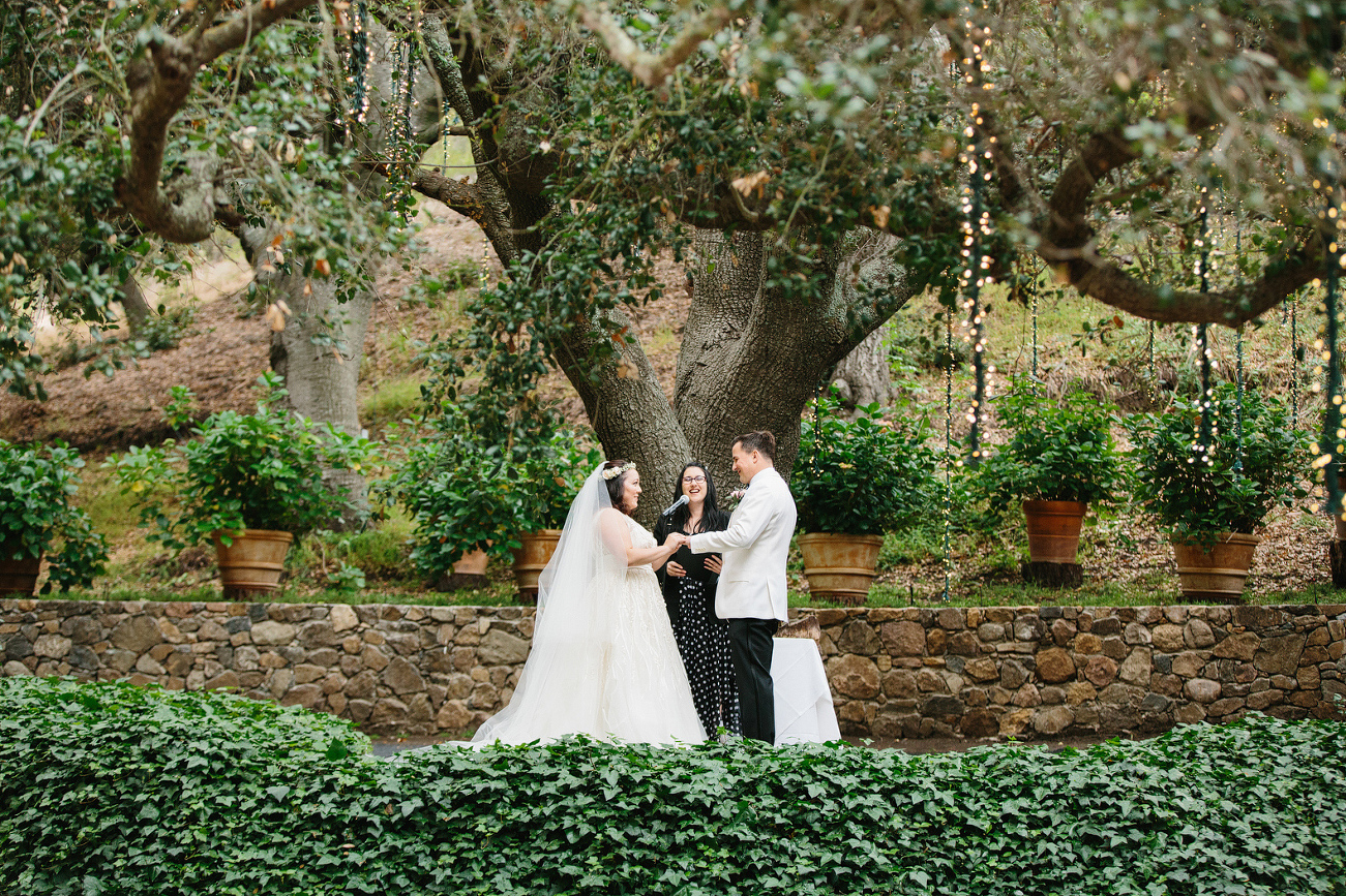 The couple exchanging rings. 