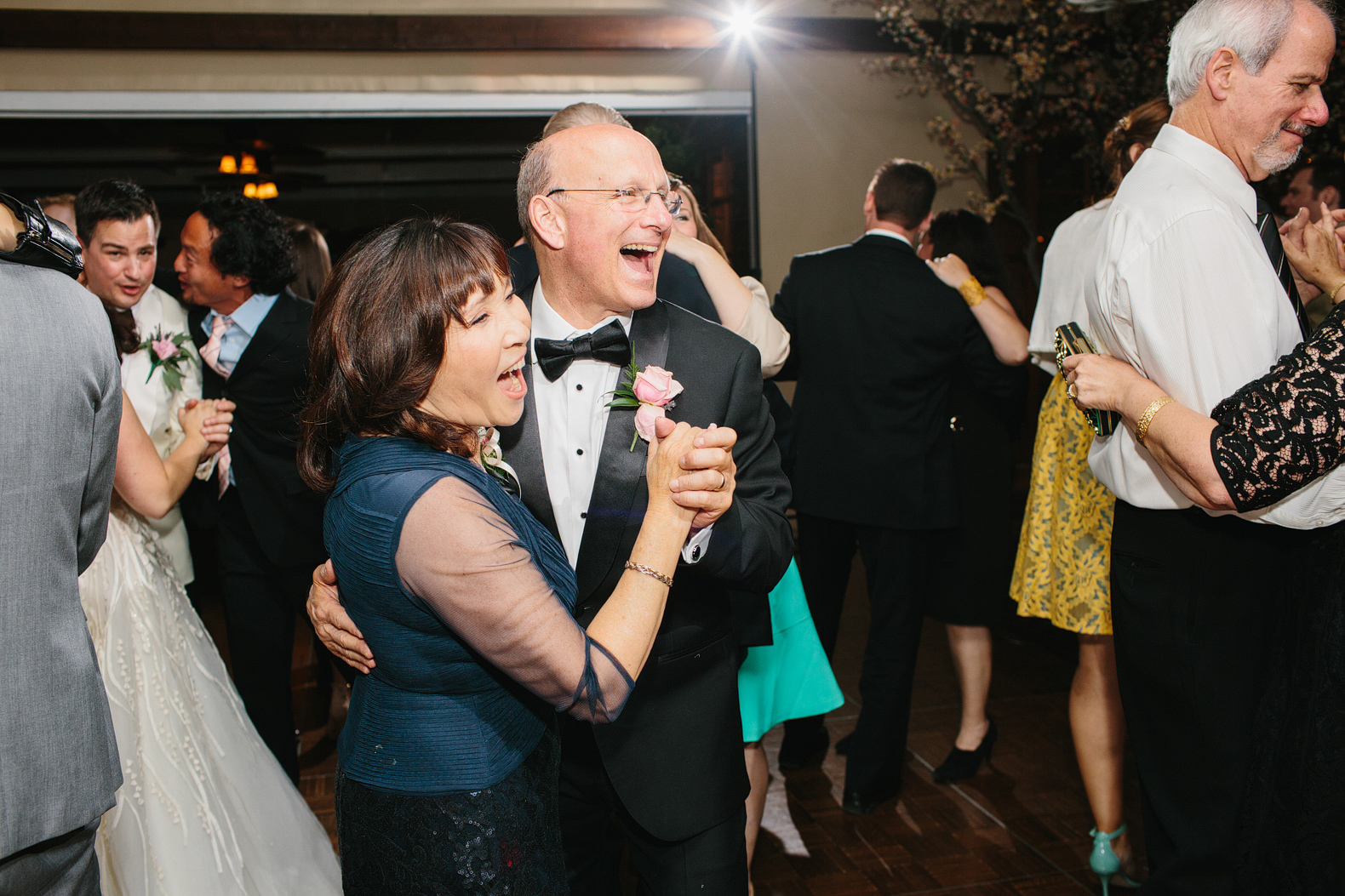 The bride's parents dancing. 