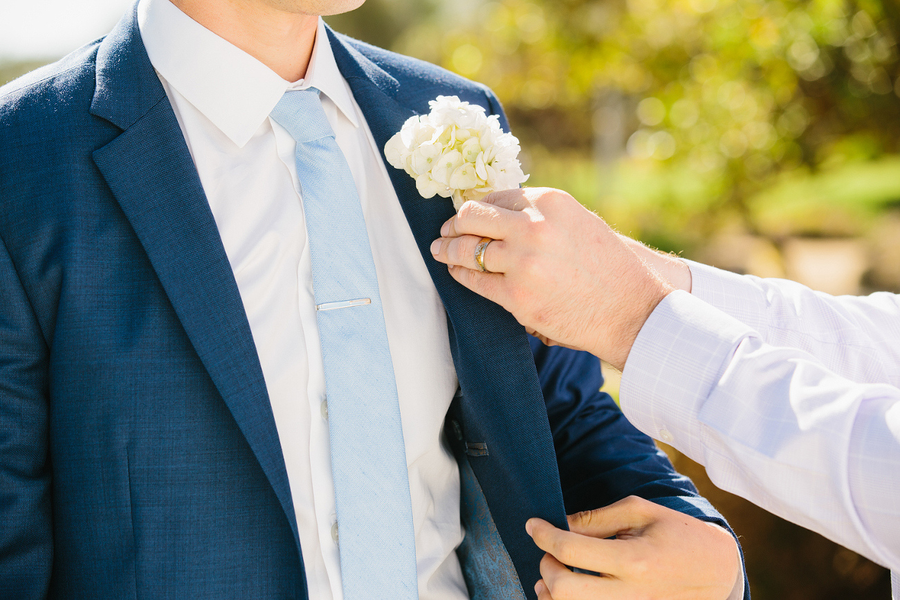 The groom getting his final touches. 