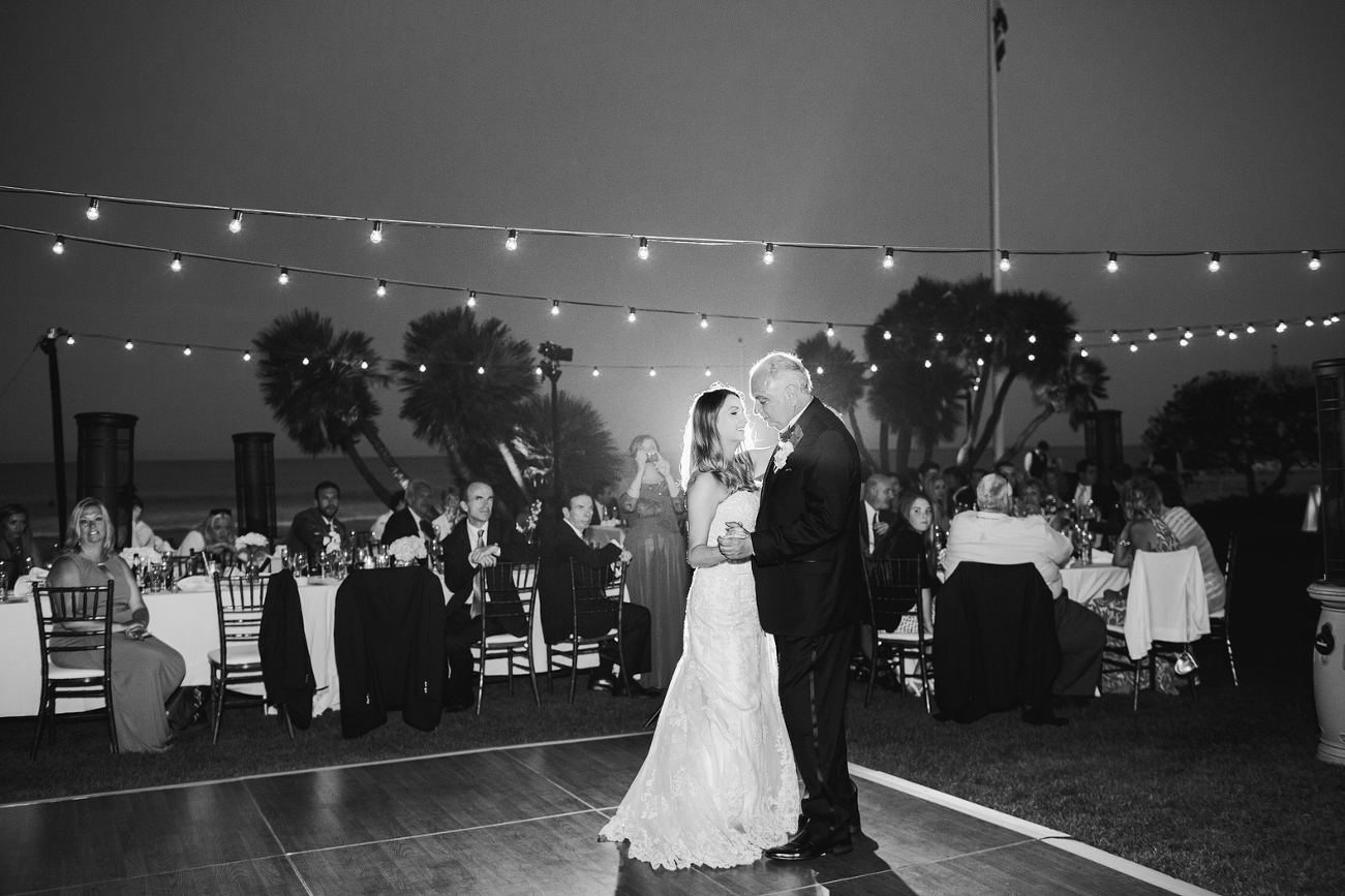 A black and white photo of the father daughter dance. 