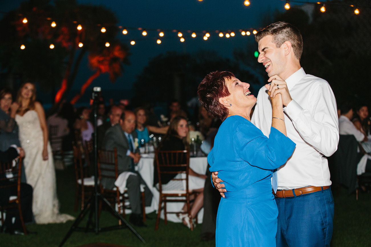 The groom dancing with his mom. 