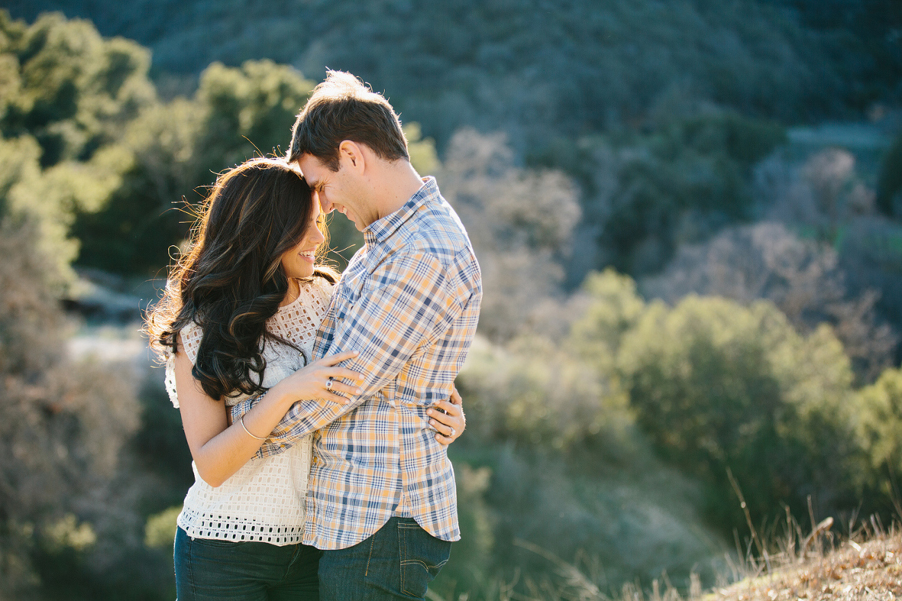 Miren and Peter holding each other. 