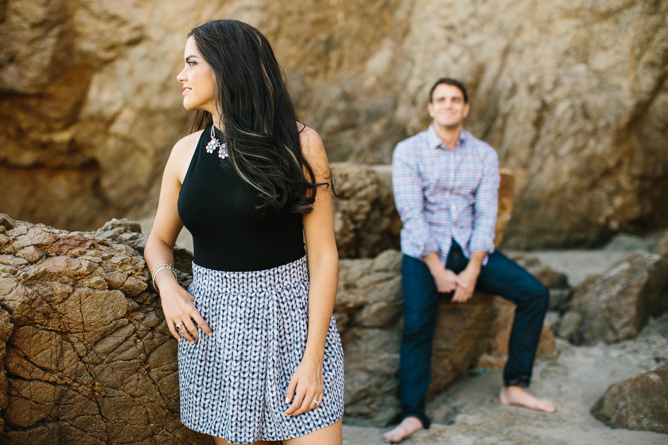 Miren leaning on a rock. 