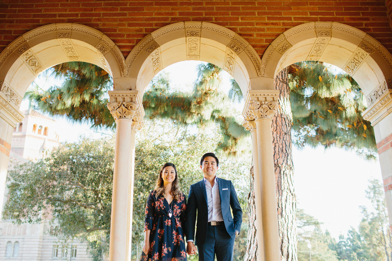 Nikki and Chad under three arches. 