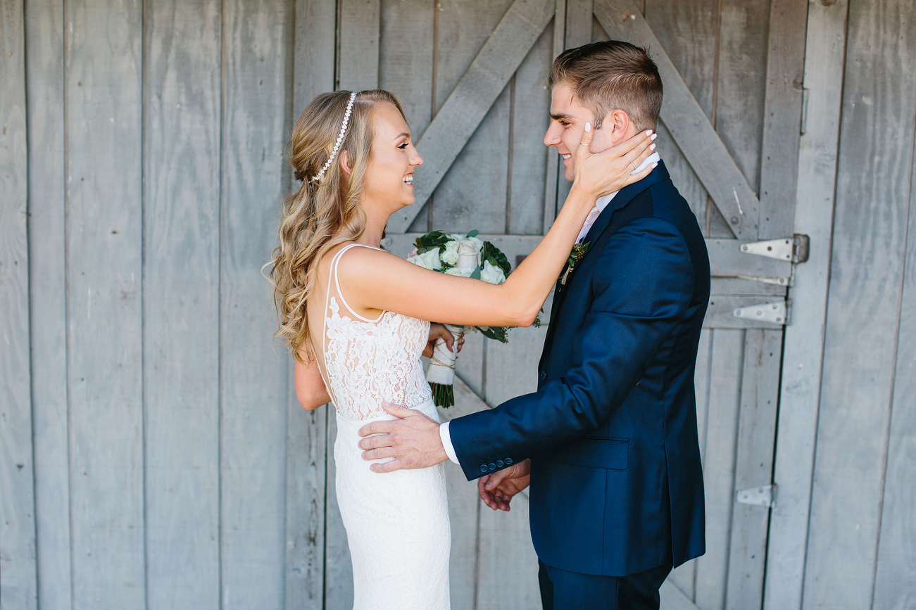 Bride and groom see eachother for the first time on wedding day