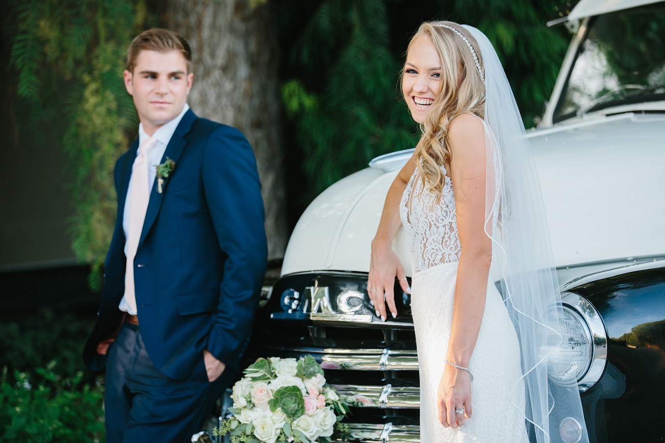 Bride and groom and vintage truck