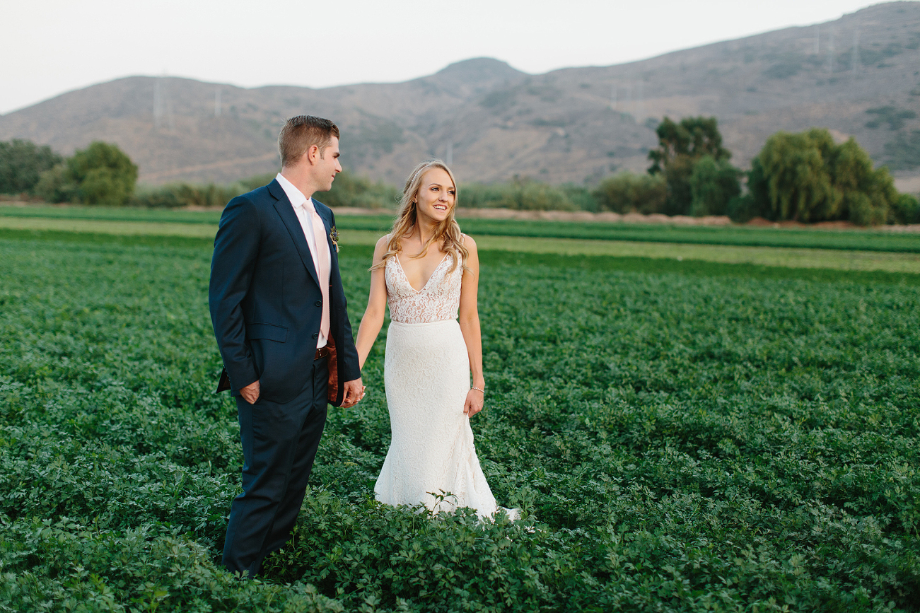 Bride and Groom in Tomato Vines. Camarillo Wedding at Maravilla Gardens photographed by The Sanadas (formerly Marianne Wilson Photography) www.TheSanadas.com