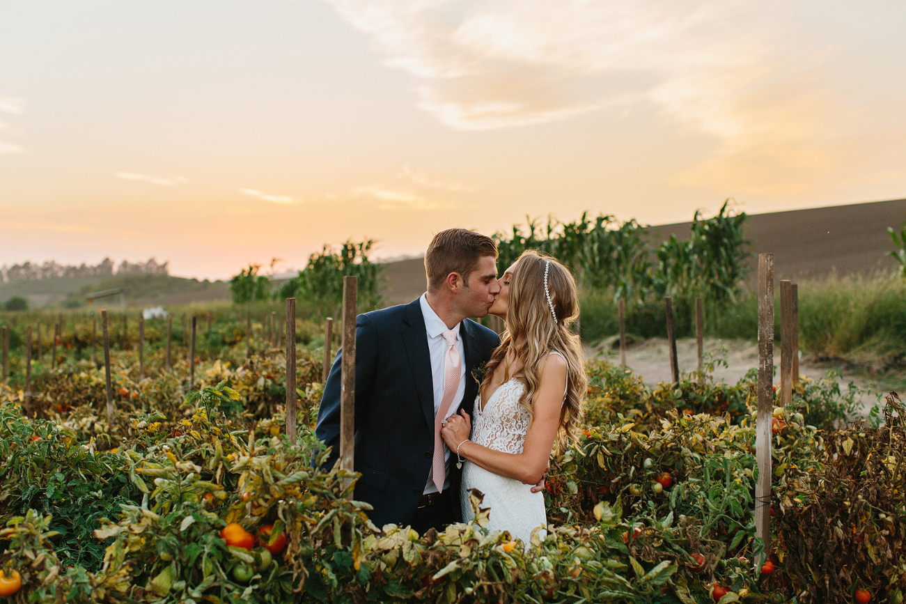 Bride and Groom in Tomato Vines. Camarillo Wedding at Maravilla Gardens photographed by The Sanadas (formerly Marianne Wilson Photography) www.TheSanadas.com