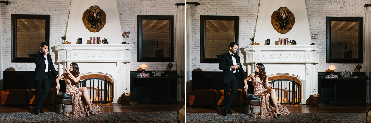 engagement photo with couple enjoying bourbon in front of a fireplace